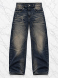 Jeans antracite effetto slavato, vista frontale del solo capo su marmo bianco — immagine rielaborata