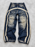 Jeans blu Cianotic con dettagli ecru a contrasto, vista frontale in piano su fondo grigio chiaro